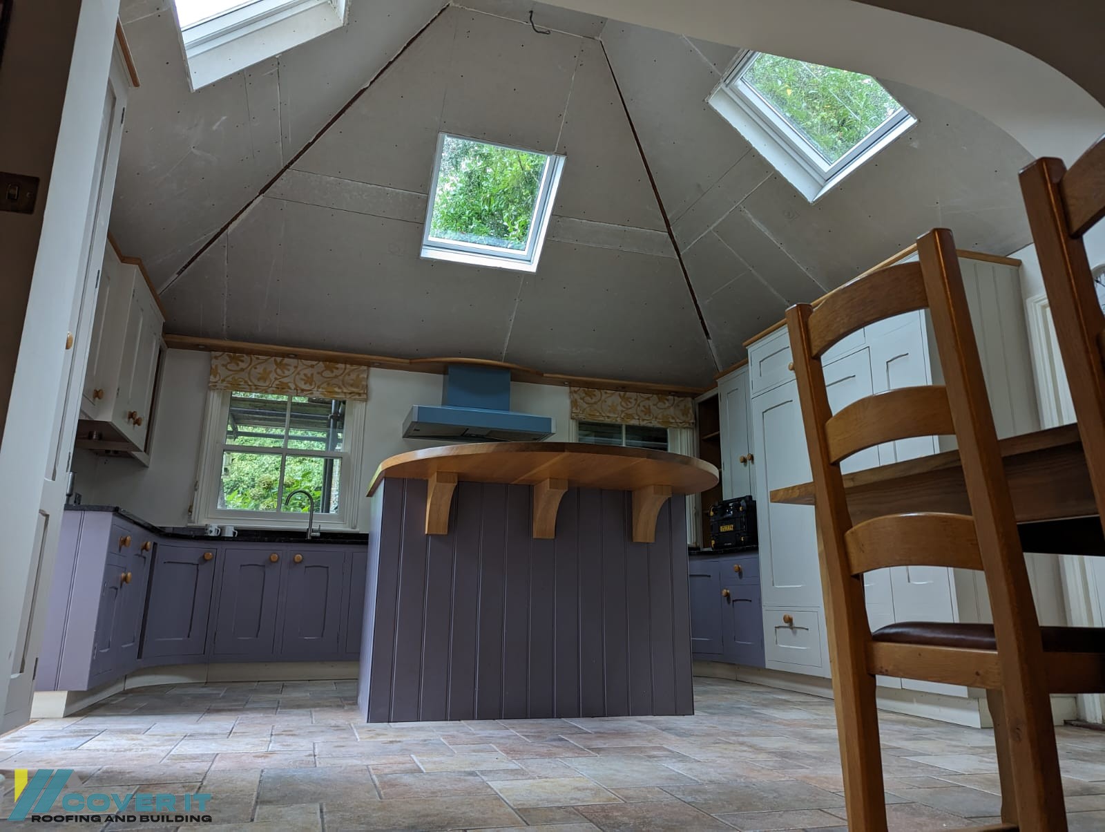 Insulated vaulted ceiling with three electric Velux rooflights in Tunbridge Wells, Kent